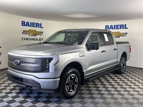 Used 2023 Ford F150 Lightning XLT AWD/4WD image 1