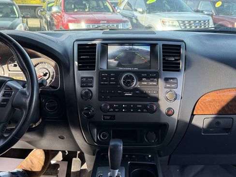 Used 2015 Nissan Armada Platinum w/ 2nd Row Captain Seat Package AWD/4WD image 13