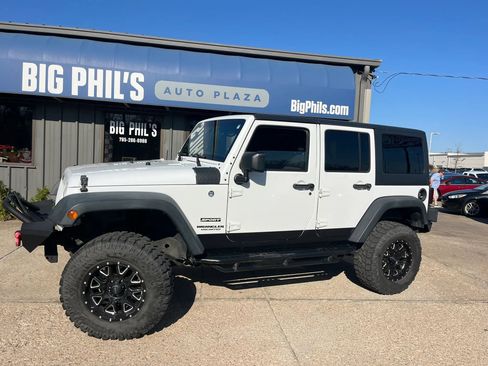 Used 2012 Jeep Wrangler Unlimited Sport image 1