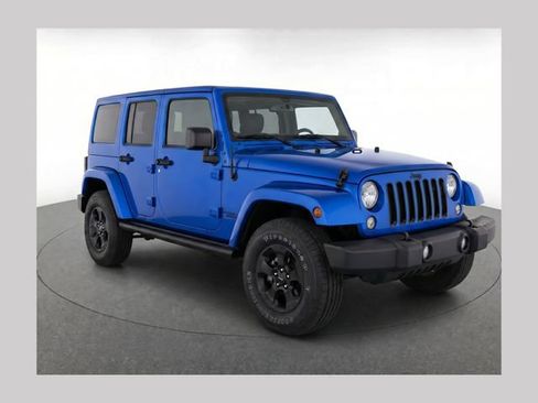 Used 2015 Jeep Wrangler Unlimited Sahara AWD/4WD image 1