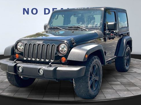 Used 2012 Jeep Wrangler Sport AWD/4WD image 1