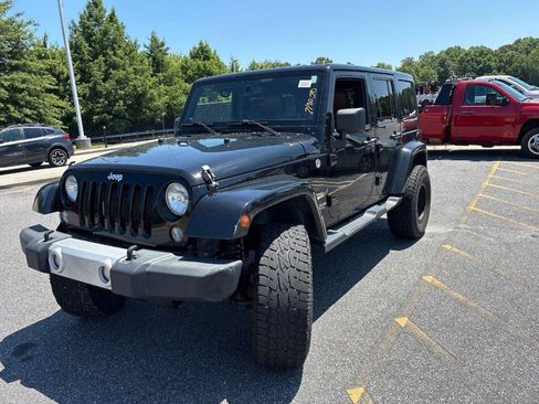 Used 2014 Jeep Wrangler Unlimited Sahara AWD/4WD image 2