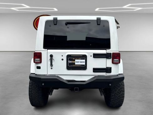 Used 2012 Jeep Wrangler Unlimited Sahara w/ Dual Top Group image 4