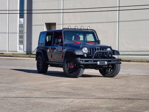 Used 2016 Jeep Wrangler Unlimited Sport AWD/4WD image 1