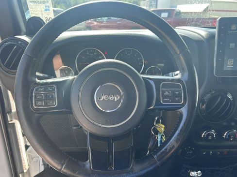 Used 2014 Jeep Wrangler Unlimited Sahara AWD/4WD image 22