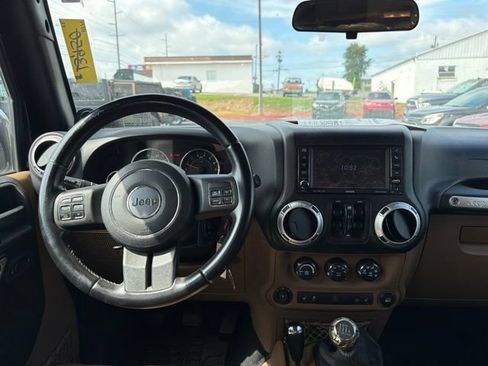 Used 2012 Jeep Wrangler Unlimited Sahara w/ Mopar Chrome Edition Group AWD/4WD image 11