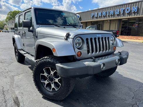 Used 2013 Jeep Wrangler Unlimited Sport AWD/4WD image 1