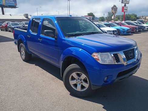 Used 2013 Nissan Frontier SV w/ SV Value Truck Pkg AWD/4WD image 1