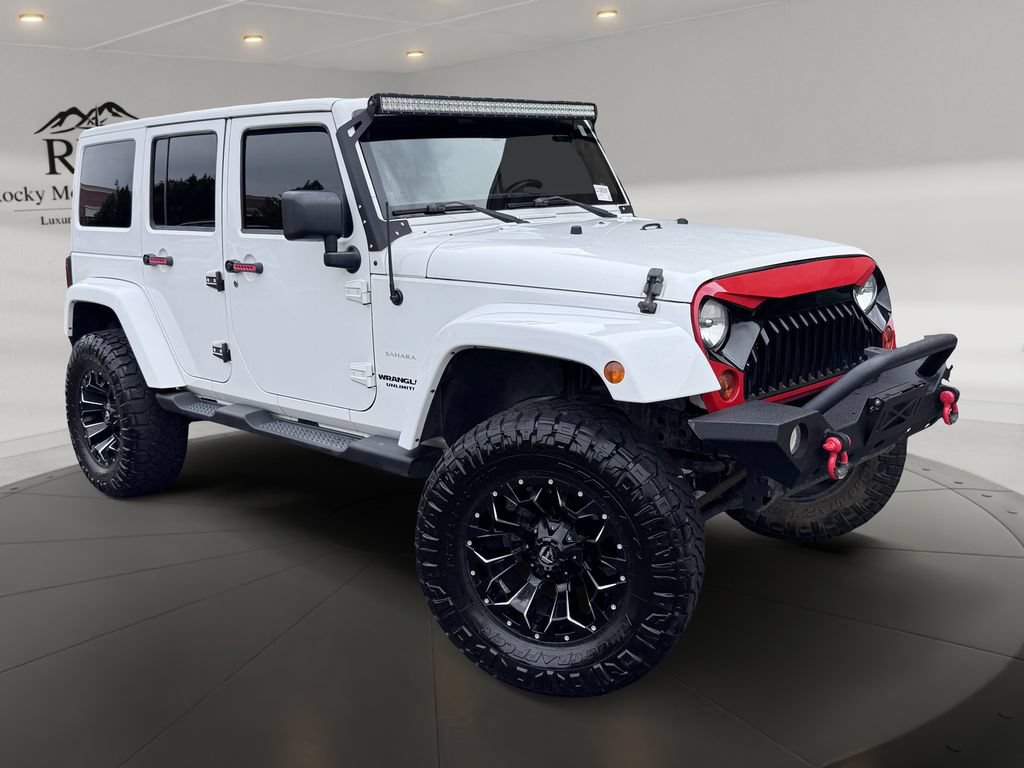 Used 2012 Jeep Wrangler Unlimited Sahara w/ Connectivity Group AWD/4WD image 1