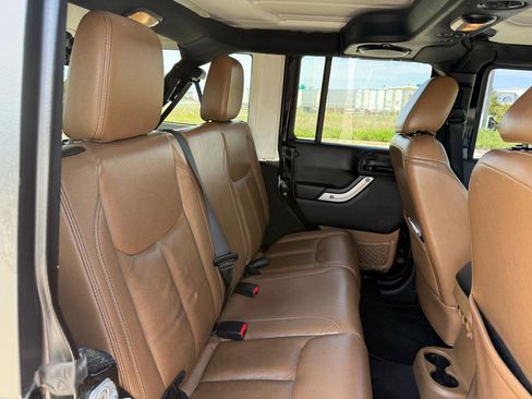 Used 2013 Jeep Wrangler Unlimited Sahara w/ Dual Top Group AWD/4WD image 21