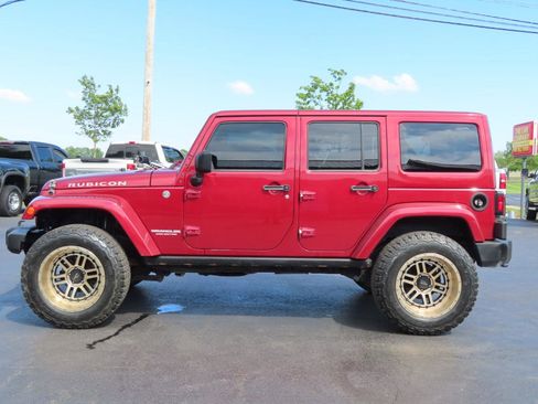 Used 2013 Jeep Wrangler Unlimited Rubicon w/ Dual Top Group AWD/4WD image 3
