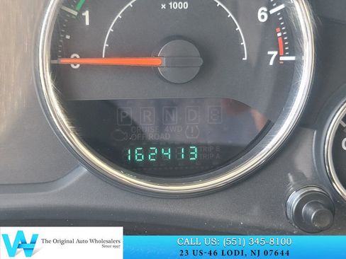 Used 2014 Jeep Wrangler Unlimited Sahara w/ Dual Top Group AWD/4WD image 25