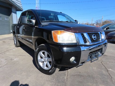 Used 2012 Nissan Titan SV w/ SV Premium Utility Pkg image 1