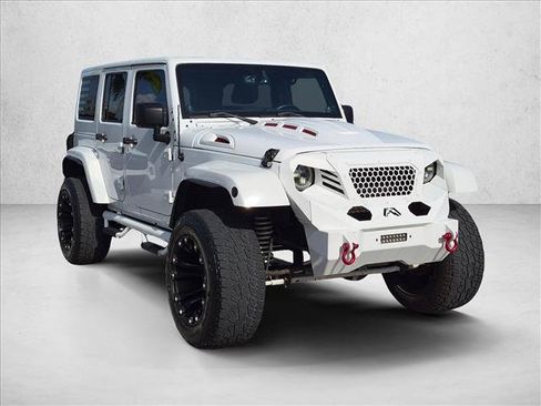 Used 2013 Jeep Wrangler Unlimited Sahara w/ Connectivity Group AWD/4WD image 3