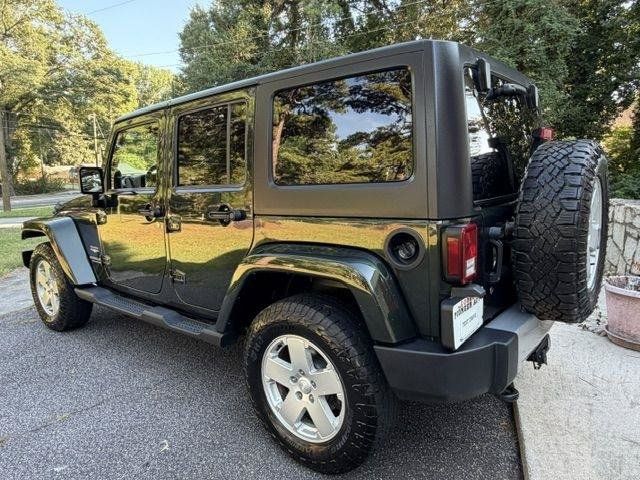 Used 2011 Jeep Wrangler Unlimited Sahara w/ Connectivity Group AWD/4WD image 3