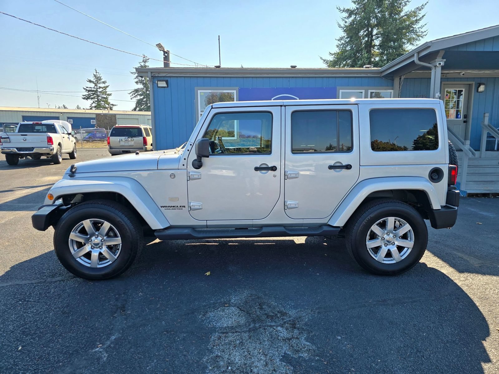 Used 2011 Jeep Wrangler Unlimited 70th Anniversary w/ Dual Top Group AWD/4WD image 2