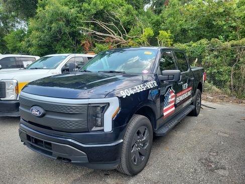 Used 2024 Ford F150 Lightning XLT AWD/4WD image 1