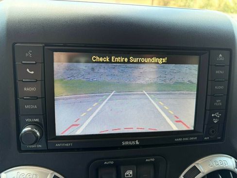 Used 2013 Jeep Wrangler Unlimited Sahara w/ Dual Top Group AWD/4WD image 21