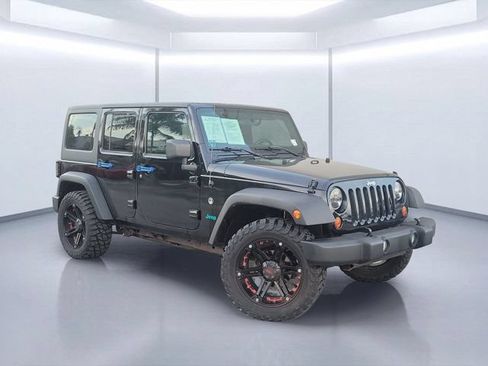Used 2011 Jeep Wrangler Unlimited Sport AWD/4WD image 1