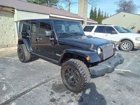 Used 2012 Jeep Wrangler Unlimited Rubicon w/ Dual Top Group image 2