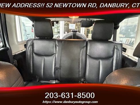Used 2014 Jeep Wrangler Unlimited Sahara w/ Dual Top Group AWD/4WD image 18