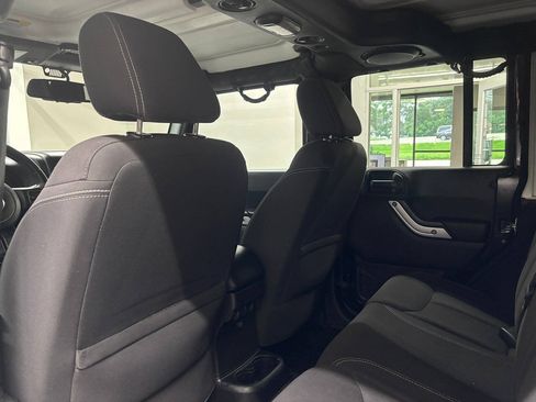 Used 2013 Jeep Wrangler Unlimited Sahara w/ Dual Top Group AWD/4WD image 18