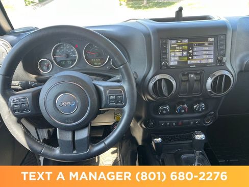 Used 2016 Jeep Wrangler Sahara w/ Connectivity Group AWD/4WD image 16