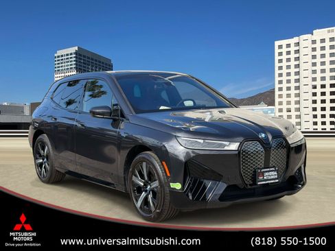 Used 2024 BMW iX xDrive50 w/ Premium Package AWD/4WD image 1