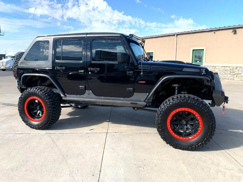 Used 2010 Jeep Wrangler Unlimited Rubicon w/ Dual Top Group image 11