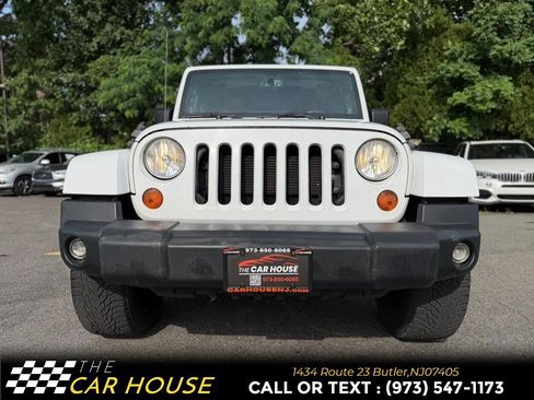 Used 2013 Jeep Wrangler Unlimited Sahara w/ Dual Top Group AWD/4WD image 12