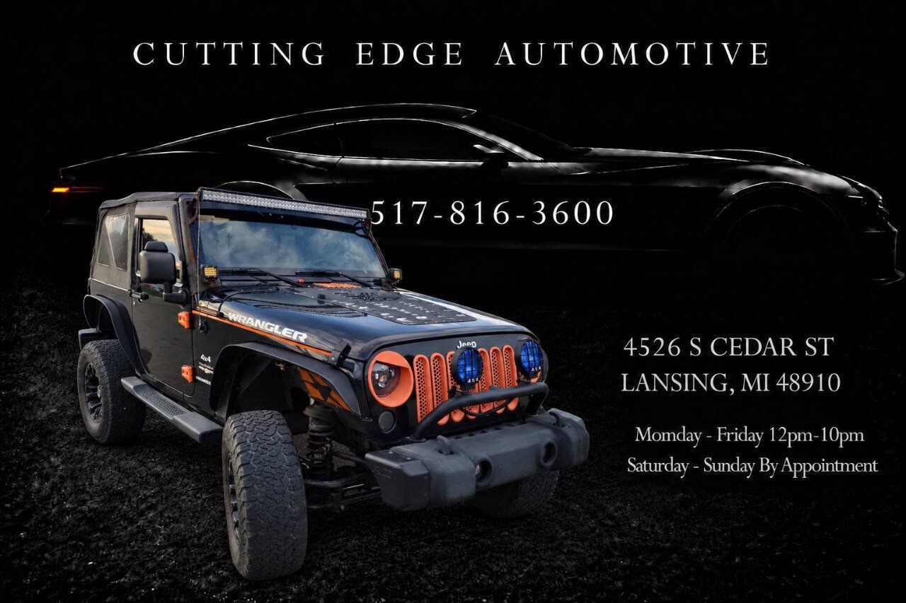 Used 2012 Jeep Wrangler Sahara w/ Dual Top Group AWD/4WD image 1