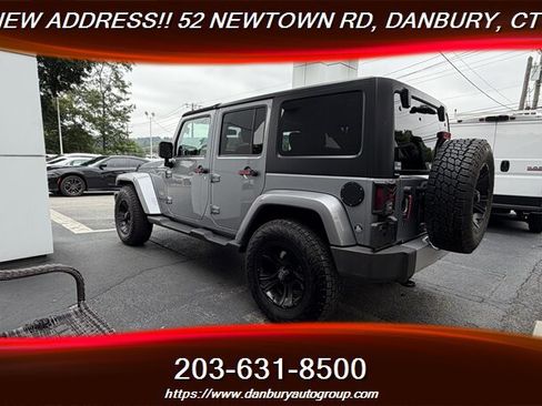 Used 2014 Jeep Wrangler Unlimited Sahara w/ Dual Top Group AWD/4WD image 3