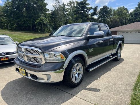 Used 2015 RAM 1500 Laramie AWD/4WD image 1