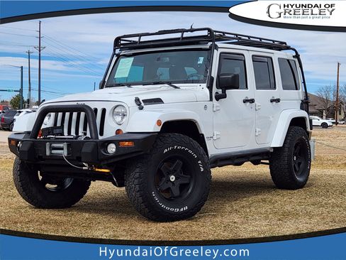 Used 2013 Jeep Wrangler Unlimited Sahara w/ Dual Top Group image 1