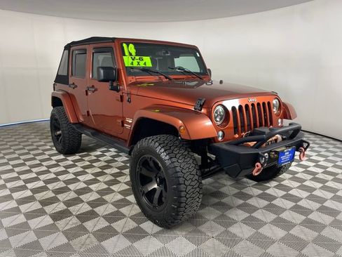 Used 2014 Jeep Wrangler Unlimited Sahara w/ Dual Top Group AWD/4WD image 25