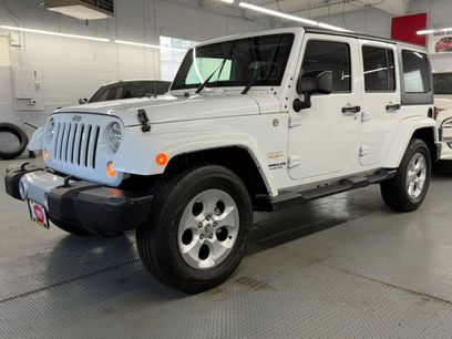 Used 2015 Jeep Wrangler Unlimited Sahara w/ Dual Top Group
