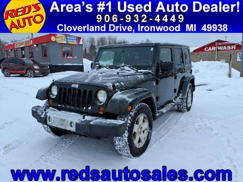 Used 2010 Jeep Wrangler Unlimited Sahara w/ Dual Top Group image 1