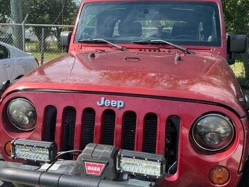 Used 2012 Jeep Wrangler Unlimited Rubicon w/ Max Tow Pkg AWD/4WD image 1