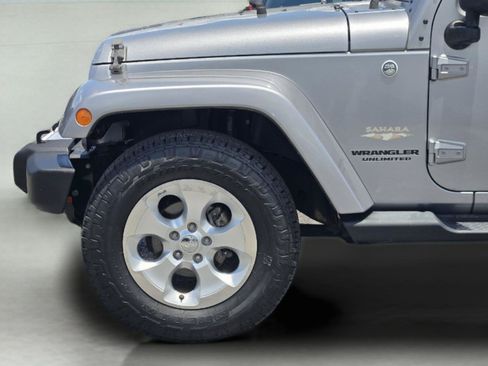 Used 2014 Jeep Wrangler Unlimited Sahara w/ Max Tow Package AWD/4WD image 9