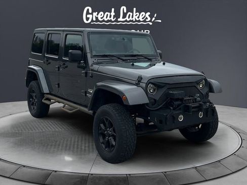 Used 2014 Jeep Wrangler Unlimited Sahara w/ Dual Top Group AWD/4WD image 7