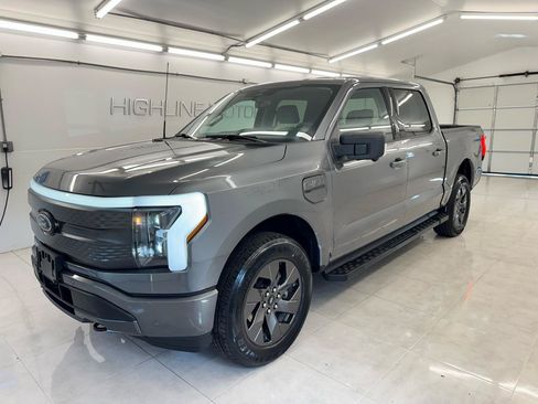 Used 2023 Ford F150 Lightning XLT w/ Equipment Group 312A High AWD/4WD image 1