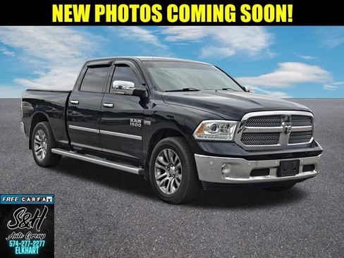 Used 2014 RAM 1500 Limited AWD/4WD image 1
