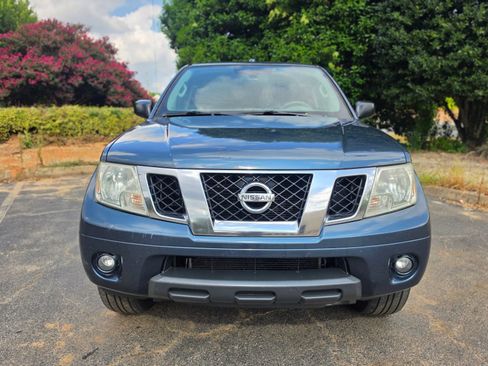 Used 2013 Nissan Frontier SV w/ SV Value Truck Pkg AWD/4WD image 1