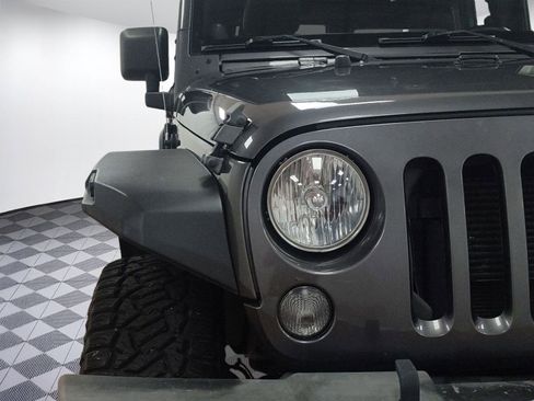 Used 2014 Jeep Wrangler Unlimited Rubicon w/ Dual Top Group image 10