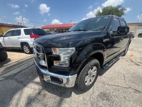 Used 2015 Ford F150 XLT AWD/4WD image 1