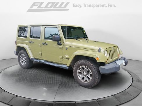 Used 2013 Jeep Wrangler Unlimited Sahara w/ Connectivity Group AWD/4WD image 1
