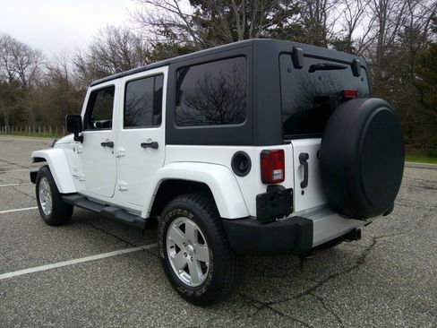 Used 2012 Jeep Wrangler Unlimited Sahara w/ Dual Top Group image 23