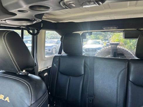 Used 2013 Jeep Wrangler Unlimited Sahara w/ Dual Top Group AWD/4WD image 22