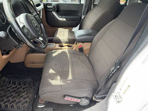 Used 2012 Jeep Wrangler Unlimited Sahara w/ Dual Top Group AWD/4WD image 16