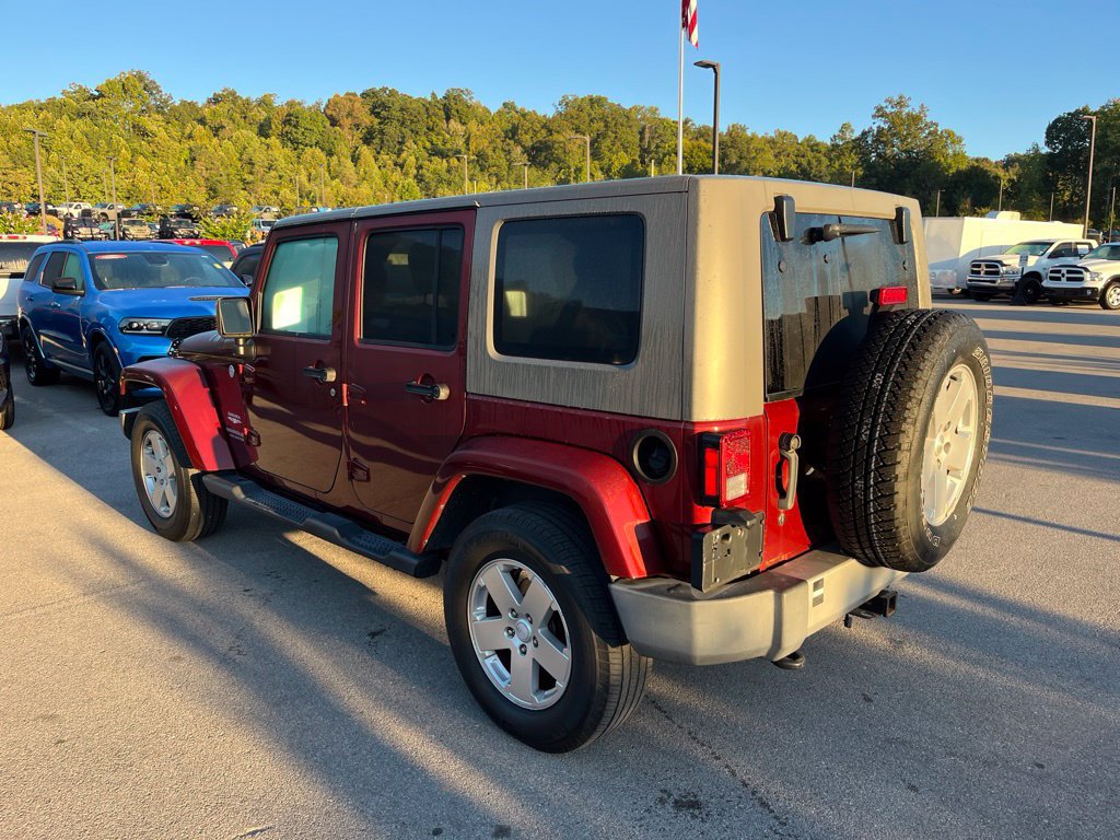Used 2010 Jeep Wrangler Unlimited Sahara w/ Dual Top Group AWD/4WD image 4